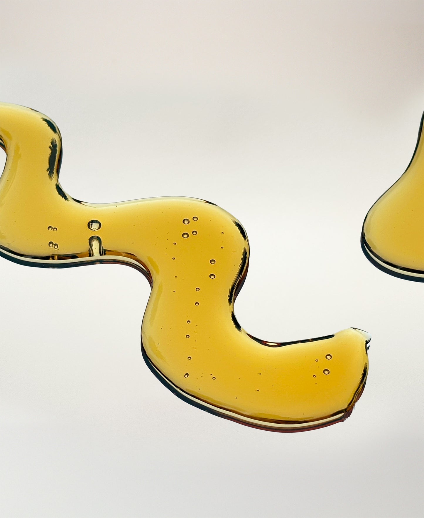 NEAP pure collagen protein gel texture on neutral background. Texture looks like honey.