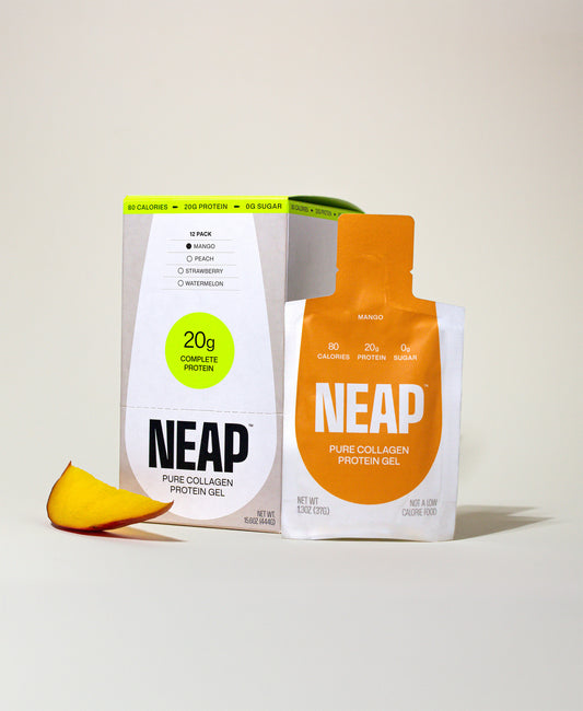 Mango Box and pouch of NEAP pure collagen protein gel with fresh mango slice on light background.