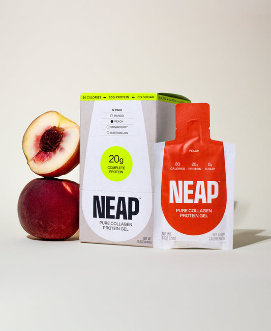 NEAP Peach pure collagen protein gel pouch and box with fresh peaches on a light background